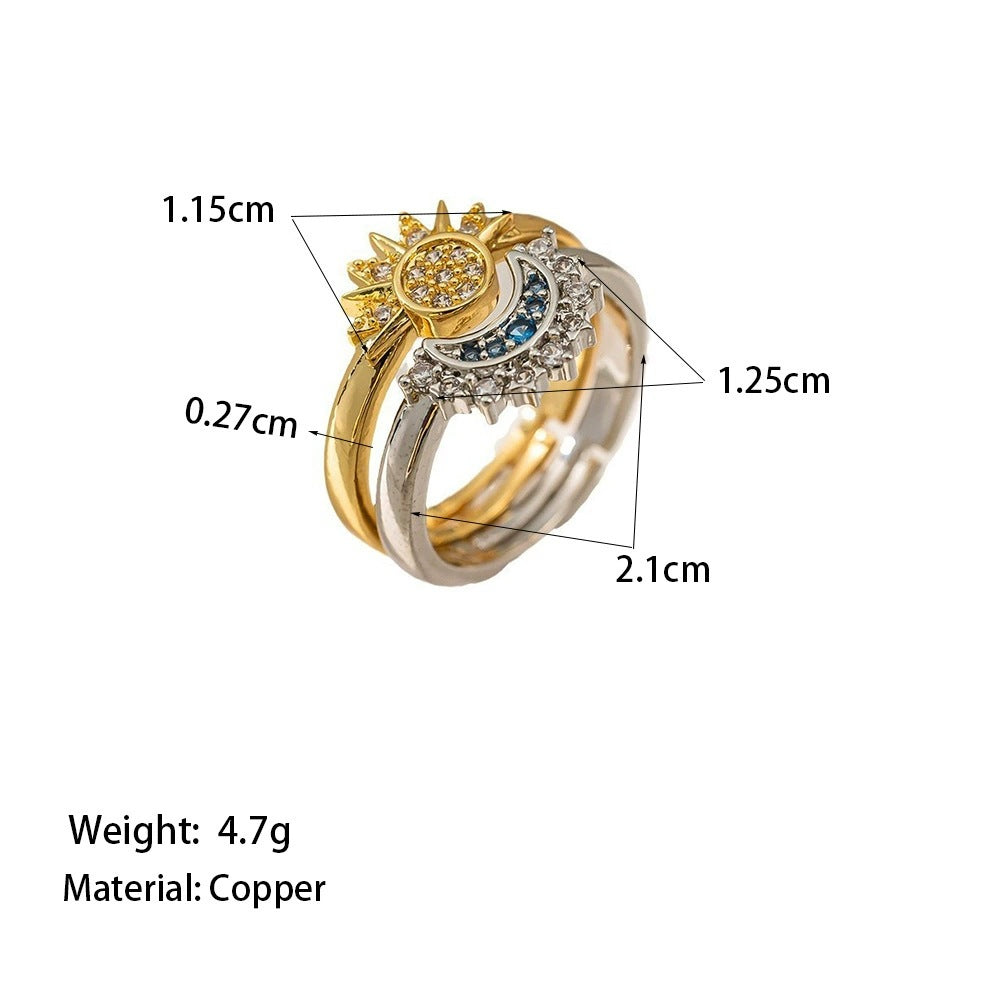 Gold and silver ring with measurements and material details on a white background