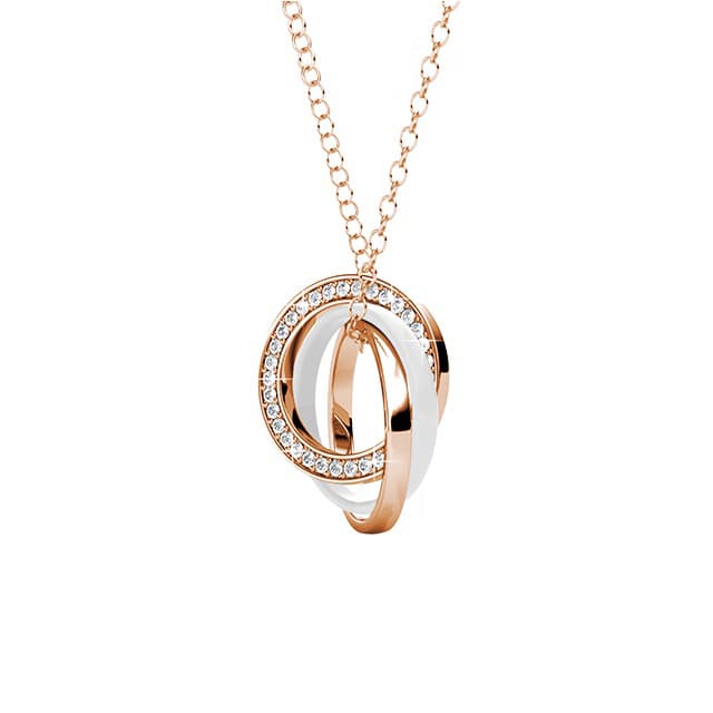 Rose gold and white gold necklace with diamonds on a white background
